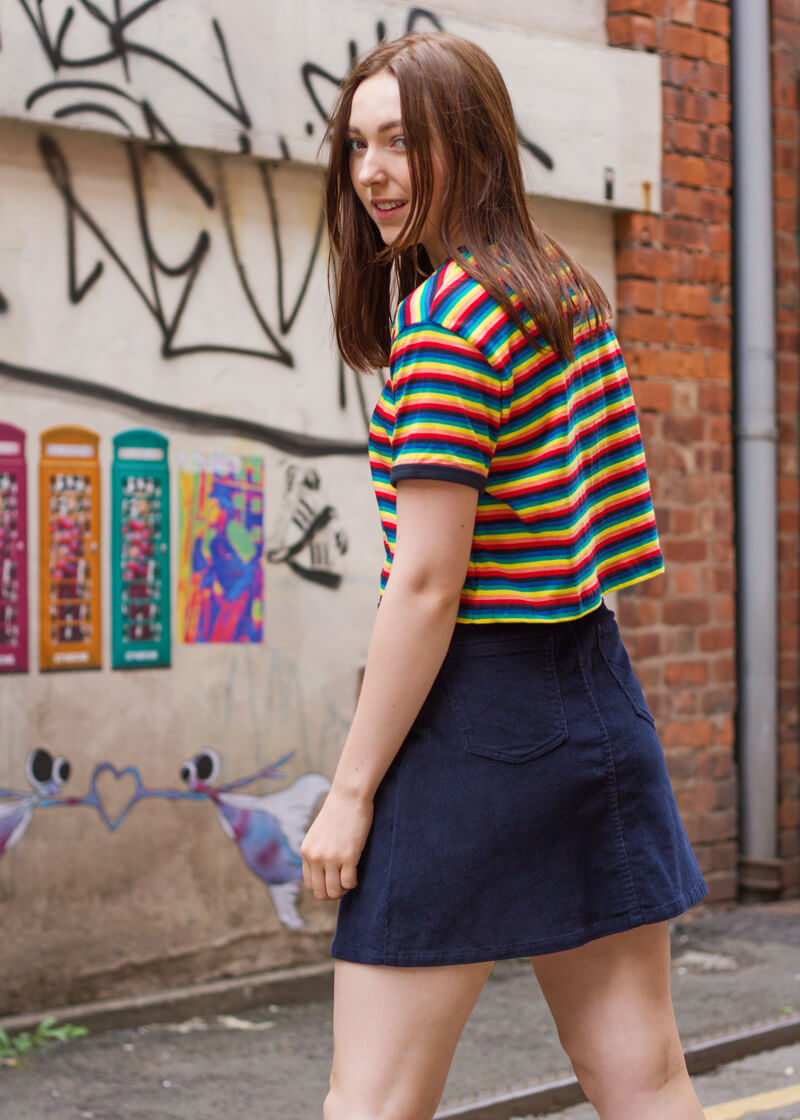 Run & Fly - Rainbow Stripe Crop T-Shirt & Noisy May - Navy Corduroy Mini Skirt